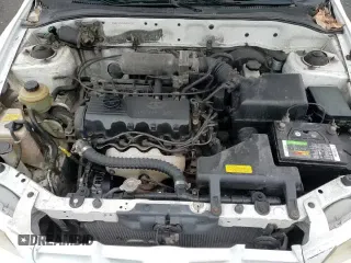 2002 Hyundai Accent z VIN KMHCF35G52U207137, wystawiony jako Copart lot #82818574 z przebiegiem 185 177 mil mil oraz Szkoda całkowita • Salvage title. Historia ofert i sprzedaży dostępna na DreamBid. Obrazek 13.