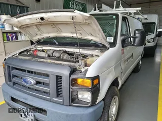 2013 Ford Econoline Cargo Commercial with VIN 1FTNE1EW6DDB01438, listed as a IAAI auction lot 42737683 with 125,160 mi miles and . Bid and sale history available at DreamBid. Image 8.