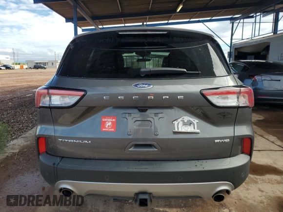 2021 Ford Escape Titanium with VIN 1FMCU9J92MUA08792, listed as a Copart auction lot 59270215 with 29,194 mi miles and Salvage title. Bid and sale history available at DreamBid. Image 6.