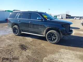 2015 Chevrolet Tahoe LTZ with VIN 1GNSCCKC4FR186632, listed as a IAAI auction lot 41482904 with 149,468 mi miles. Bid and sale history available at carsss.com. Image 1.