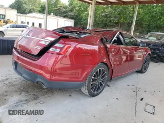 2017 Ford Taurus SEL z VIN 1FAHP2E8XHG131857, wystawiony jako Copart lot #60652585 z przebiegiem 90 000 mil mil oraz Szkoda całkowita • Salvage title. Historia ofert i sprzedaży dostępna na DreamBid. Obrazek 3.