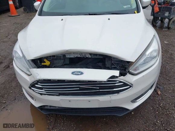 2015 Ford Focus Titanium with VIN 1FADP3N23FL293432, listed as a IAAI auction lot 41929774 with 100,865 mi miles. Bid and sale history available at carsss.com. Image 6.
