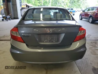 2012 Honda Civic LX z VIN 2HGFB2F59CH313357, wystawiony jako Copart lot #59526905 z przebiegiem 253 322 mil mil oraz Czysty tytuł • Clean title. Historia ofert i sprzedaży dostępna na DreamBid. Obrazek 6.