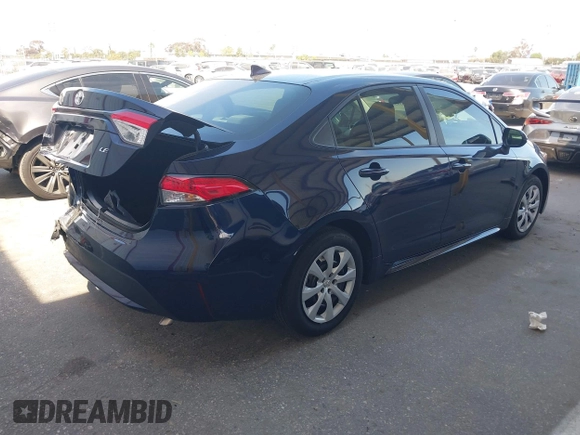 2022 Toyota Corolla LE with VIN 5YFEPMAE0NP320936, listed as a IAAI auction lot 42010316 with 21,686 mi miles. Bid and sale history available at carsss.com. Image 4.