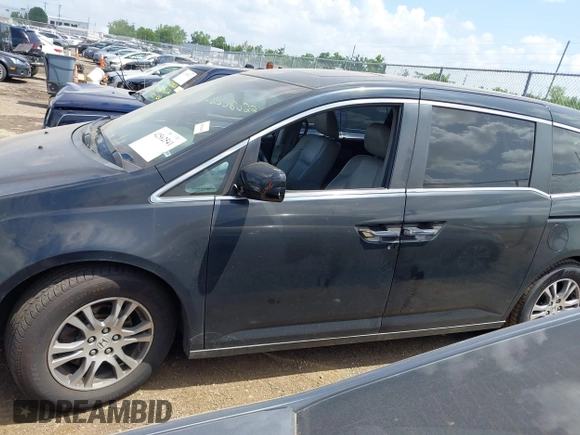 2011 Honda Odyssey EX-L with VIN 5FNRL5H62BB063125, listed as a IAAI auction lot 42562541 with 140,787 mi miles and . Bid and sale history available at DreamBid. Image 14.