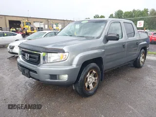 2009 Honda Ridgeline RT with VIN 5FPYK162X9B100513, listed as a IAAI auction lot 42683432 with 204,260 mi miles and . Bid and sale history available at DreamBid. Image 2.