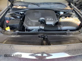 2017 Dodge Challenger SXT z VIN 2C3CDZAG7HH658606, wystawiony jako Copart lot #52131045 z przebiegiem 100 223 mil mil oraz Szkoda całkowita • Salvage title. Historia ofert i sprzedaży dostępna na DreamBid. Obrazek 11.