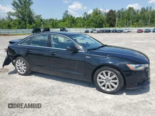 2013 Audi A6 Premium Plus with VIN WAUGGAFC4DN096402, listed as a Copart auction lot 63414095 with 141,483 mi miles and Salvage title. Bid and sale history available at DreamBid. Image 4.