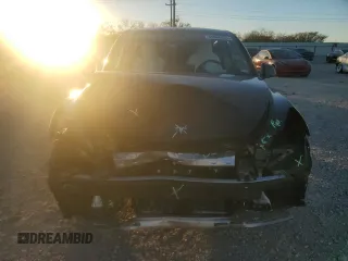 2024 Tesla Model Y с VIN 7SAYGDED4RA324326, выставлен на аукционе Copart как лот 86965534 с пробегом Не указан миль и Списание • Salvage title. История ставок и продаж доступна на DreamBid. Изображение 5.