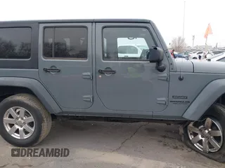 2014 Jeep Wrangler Unlimited Sport with VIN 1C4BJWDG4EL319259, listed as a IAAI auction lot 41494299 with 141,699 mi miles. Bid and sale history available at carsss.com. Image 13.