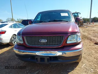 2003 Ford F-150 XL with VIN 1FTRX17W43NA07186, listed as a IAAI auction lot 41864354 with 123,565 mi miles. Bid and sale history available at carsss.com. Image 12.