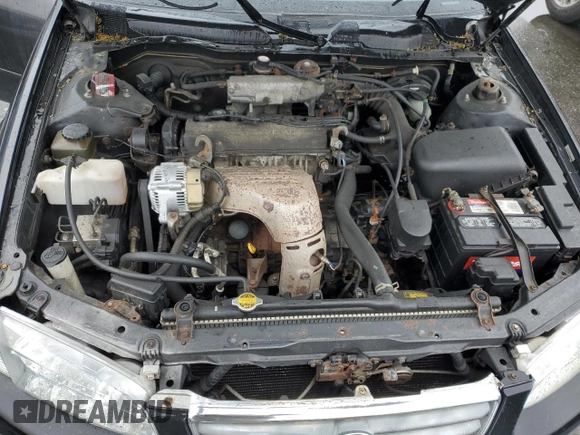 2000 Toyota Camry CE z VIN JT2BG22K7Y0479410, wystawiony jako Copart lot #57871825 z przebiegiem 222 941 mil mil oraz Czysty tytuł • Clean title. Historia ofert i sprzedaży dostępna na DreamBid. Obrazek 11.