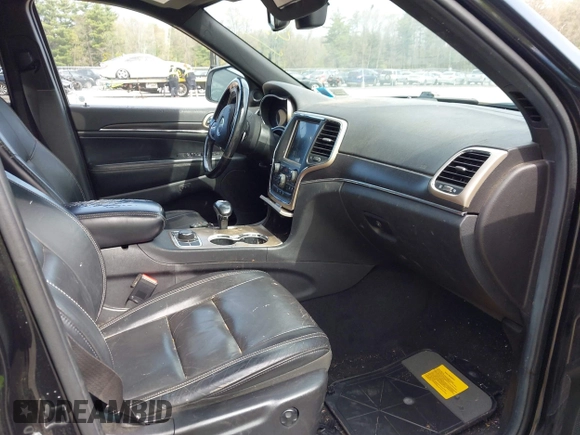 2014 Jeep Grand Cherokee Limited with VIN 1C4RJFBG9EC258590, listed as a IAAI auction lot 42178333 with 125,861 mi miles and . Bid and sale history available at DreamBid. Image 5.