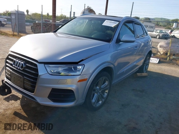 2017 Audi Q3 Premium Plus z VIN WA1JCCFSXHR000319, wystawiony jako IAAI lot #41986889 z przebiegiem 74 675 mil mil oraz . Historia ofert i sprzedaży dostępna na DreamBid. Obrazek 16.