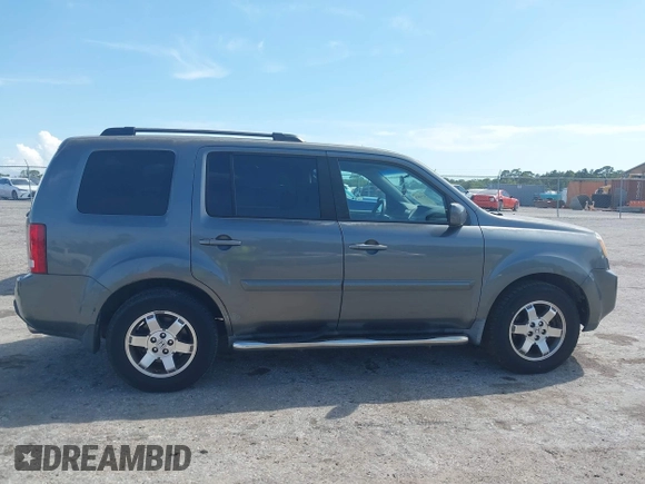 2011 Honda Pilot EX with VIN 5FNYF3H4XBB001140, listed as a IAAI auction lot 41940476 with 254,136 mi miles and . Bid and sale history available at carsss.com. Image 14.