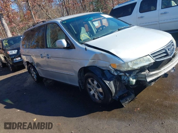 2004 Honda Odyssey EX z VIN 5FNRL18674B080319, wystawiony jako IAAI lot #40819411 z przebiegiem 201 820 mil mil oraz . Historia ofert i sprzedaży dostępna na DreamBid. Obrazek 1.