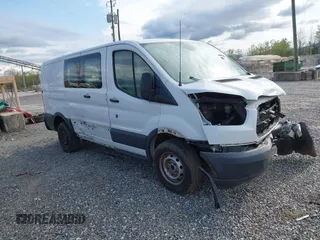 2016 Ford Transit Cargo with VIN 1FTYR1ZM2GKA38963, listed as a IAAI auction lot 42027447 with 70,659 mi miles and . Bid and sale history available at DreamBid. Image 1.