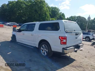 2019 Ford F-150 XL with VIN 1FTEW1C47KKE22590, listed as a IAAI auction lot 42418181 with 123,197 mi miles and . Bid and sale history available at DreamBid. Image 3.