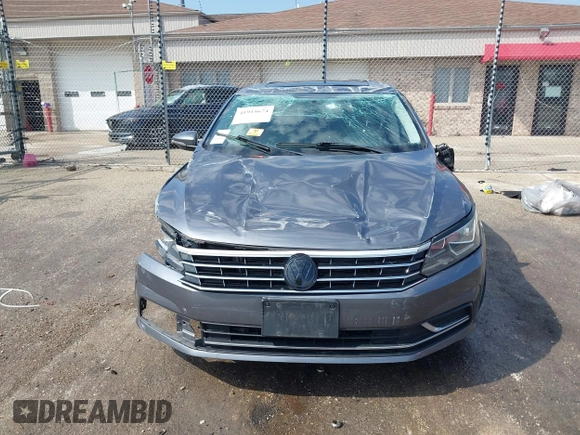 2017 Volkswagen Passat SE with VIN 1VWBT7A36HC039748, listed as a IAAI auction lot 41915674 with 57,012 mi miles and . Bid and sale history available at DreamBid. Image 11.