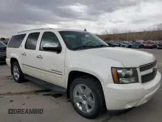 2010 Chevrolet Suburban LTZ with VIN 1GNUKKE35AR292291, listed as a Copart auction lot 49627085 with 233,359 mi miles and Salvage Title. Bid and sale history available at carsss.com. Image 4.