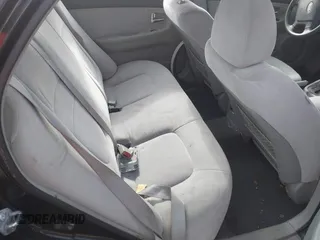 2007 Kia Spectra EX with VIN KNAFE122X75454914, listed as a IAAI auction lot 41711981 with 179,382 mi miles. Bid and sale history available at carsss.com. Image 8.