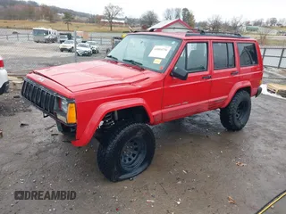 1996 Jeep Cherokee Sport with VIN 1J4FJ68S6TL299152, listed as a IAAI auction lot 41004736 with 277,819 mi miles. Bid and sale history available at carsss.com. Image 2.