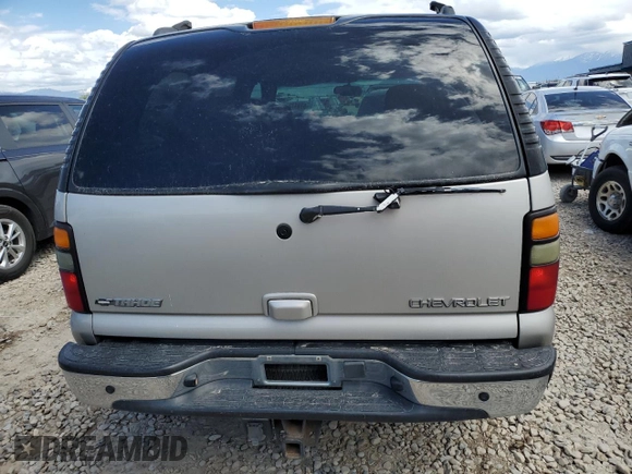 2004 Chevrolet Tahoe LS z VIN 1GNEC13T34R228124, wystawiony jako Copart lot #57317335 z przebiegiem 198 495 mil mil oraz Szkoda całkowita • Salvage title. Historia ofert i sprzedaży dostępna na DreamBid. Obrazek 6.