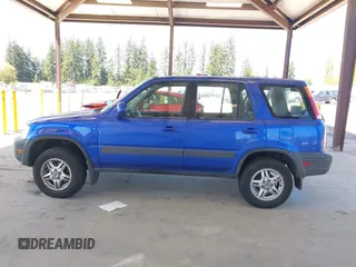 2001 Honda CR-V EX with VIN JHLRD18641C053166, listed as a IAAI auction lot 42078219 with 157,355 mi miles and . Bid and sale history available at DreamBid. Image 14.