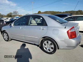 2006 Kia Spectra EX with VIN KNAFE121965372856, listed as a Copart auction lot 77365514 with 316,947 mi miles and Clean Title. Bid and sale history available at carsss.com. Image 2.