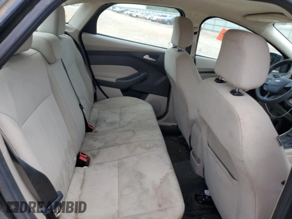 2018 Ford Focus SE z VIN 1FADP3F28JL319269, wystawiony jako Copart lot #59604555 z przebiegiem 167 726 mil mil oraz Szkoda całkowita • Salvage title. Historia ofert i sprzedaży dostępna na DreamBid. Obrazek 10.