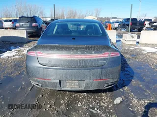 2016 Lincoln MKZ z VIN 3LN6L2JK1GR623839, wystawiony jako IAAI lot #41652096 z przebiegiem 109 931 mil mil oraz . Historia ofert i sprzedaży dostępna na DreamBid. Obrazek 16.