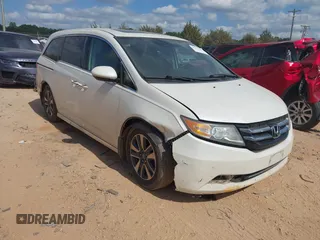 2015 Honda Odyssey Touring Elite с VIN 5FNRL5H93FB077552, выставлен на аукционе IAAI как лот 42152238 с пробегом 215 486 миль миль и . История ставок и продаж доступна на DreamBid. Изображение 1.