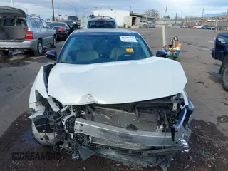 2018 Nissan Maxima SV with VIN 1N4AA6AP5JC405437, listed as a IAAI auction lot 41180470 with 59,319 mi miles and . Bid and sale history available at DreamBid. Image 12.