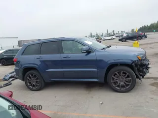 2021 Jeep Grand Cherokee High Altitude with VIN 1C4RJFCG7MC580318, listed as a IAAI auction lot 42490009 with 88,195 mi miles and . Bid and sale history available at DreamBid. Image 14.