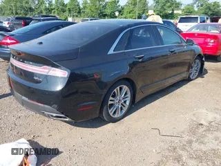2014 Lincoln MKZ z VIN 3LN6L2G91ER821841, wystawiony jako IAAI lot #42655383 z przebiegiem Nie podano mil oraz . Historia ofert i sprzedaży dostępna na DreamBid. Obrazek 4.