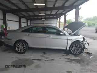 2014 Ford Taurus Limited с VIN 1FAHP2F89EG186147, выставлен на аукционе IAAI как лот 42228000 с пробегом 179 863 миль миль и . История ставок и продаж доступна на DreamBid. Изображение 14.