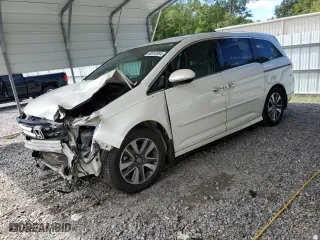 2016 Honda Odyssey Touring with VIN 5FNRL5H98GB019244, listed as a Copart auction lot 71726694 with 165763 miles and Salvage Title. Bid and sale history available at carsss.com. Image 1.