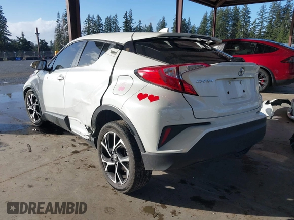 2021 Toyota C-HR LE with VIN NMTKHMBX2MR124470, listed as a IAAI auction lot 41725244 with Not Provided miles. Bid and sale history available at carsss.com. Image 3.