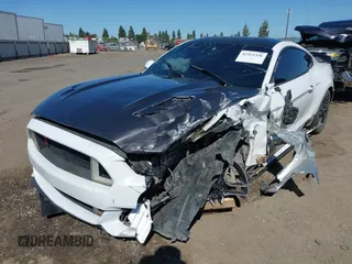 2016 Ford Mustang EcoBoost z VIN 1FA6P8TH3G5221133, wystawiony jako IAAI lot #42325336 z przebiegiem 135 065 mil mil oraz . Historia ofert i sprzedaży dostępna na DreamBid. Obrazek 20.