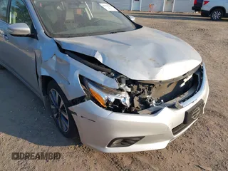 2016 Nissan Altima SR with VIN 1N4AL3AP2GC287591, listed as a IAAI auction lot 41758321 with 114,894 mi miles and . Bid and sale history available at carsss.com. Image 6.