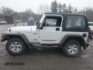 2006 Jeep Wrangler X with VIN 1J4FA39SX6P709588, listed as a IAAI auction lot 41927435 with 227,990 mi miles. Bid and sale history available at carsss.com. Image 14.