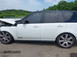 2015 Land Rover Range Rover HSE with VIN SALGS2VF0FA239075, listed as a IAAI auction lot 42278987 with 99,398 mi miles and . Bid and sale history available at DreamBid. Image 14.