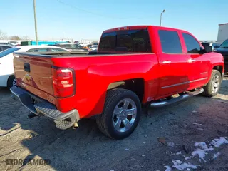 2014 Chevrolet Silverado 1500 LTZ with VIN 3GCUKSEC5EG171579, listed as a IAAI auction lot 41400865 with 105,738 mi miles. Bid and sale history available at carsss.com. Image 4.