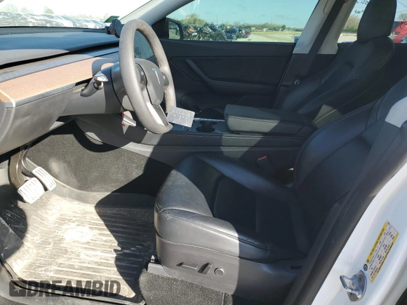 2021 Tesla Model Y Performance with VIN 5YJYGDEF3MF262878, listed as a Copart auction lot 52897595 with 50,939 mi miles and Salvage Title. Bid and sale history available at DreamBid. Image 7.