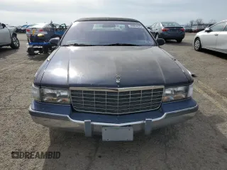 1996 Cadillac Fleetwood z VIN 1G6DW52P7TR700057, wystawiony jako Copart lot #49994225 z przebiegiem 115 819 mil mil oraz Czysty tytuł • Clean title. Historia ofert i sprzedaży dostępna na DreamBid. Obrazek 5.
