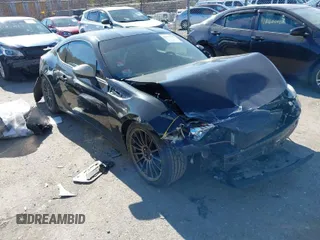 2016 Subaru BRZ Premium with VIN JF1ZCAB18G9601887, listed as a IAAI auction lot 41879355 with 165,677 mi miles and . Bid and sale history available at DreamBid. Image 1.