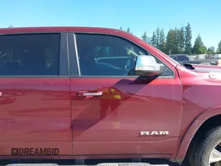 2019 Ram 1500 Laramie with VIN 1C6SRFJT2KN677400, listed as a IAAI auction lot 42441010 with 76,750 mi miles and . Bid and sale history available at DreamBid. Image 14.