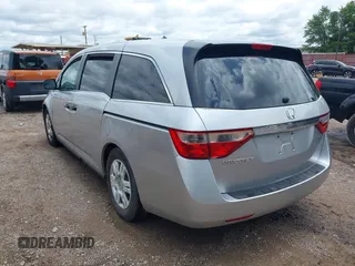 2011 Honda Odyssey LX with VIN 5FNRL5H26BB027144, listed as a IAAI auction lot 42456465 with 201,901 mi miles and . Bid and sale history available at DreamBid. Image 3.
