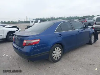 2007 Toyota Camry CE with VIN 4T1BE46K67U060812, listed as a IAAI auction lot 41885249 with 148,777 mi miles. Bid and sale history available at carsss.com. Image 4.