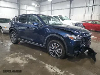 2017 Mazda CX-5 Grand Touring with VIN JM3KFBDL8H0163490, listed as a Copart auction lot 44650115 with 90,020 mi miles and Salvage Title. Bid and sale history available at carsss.com. Image 4.